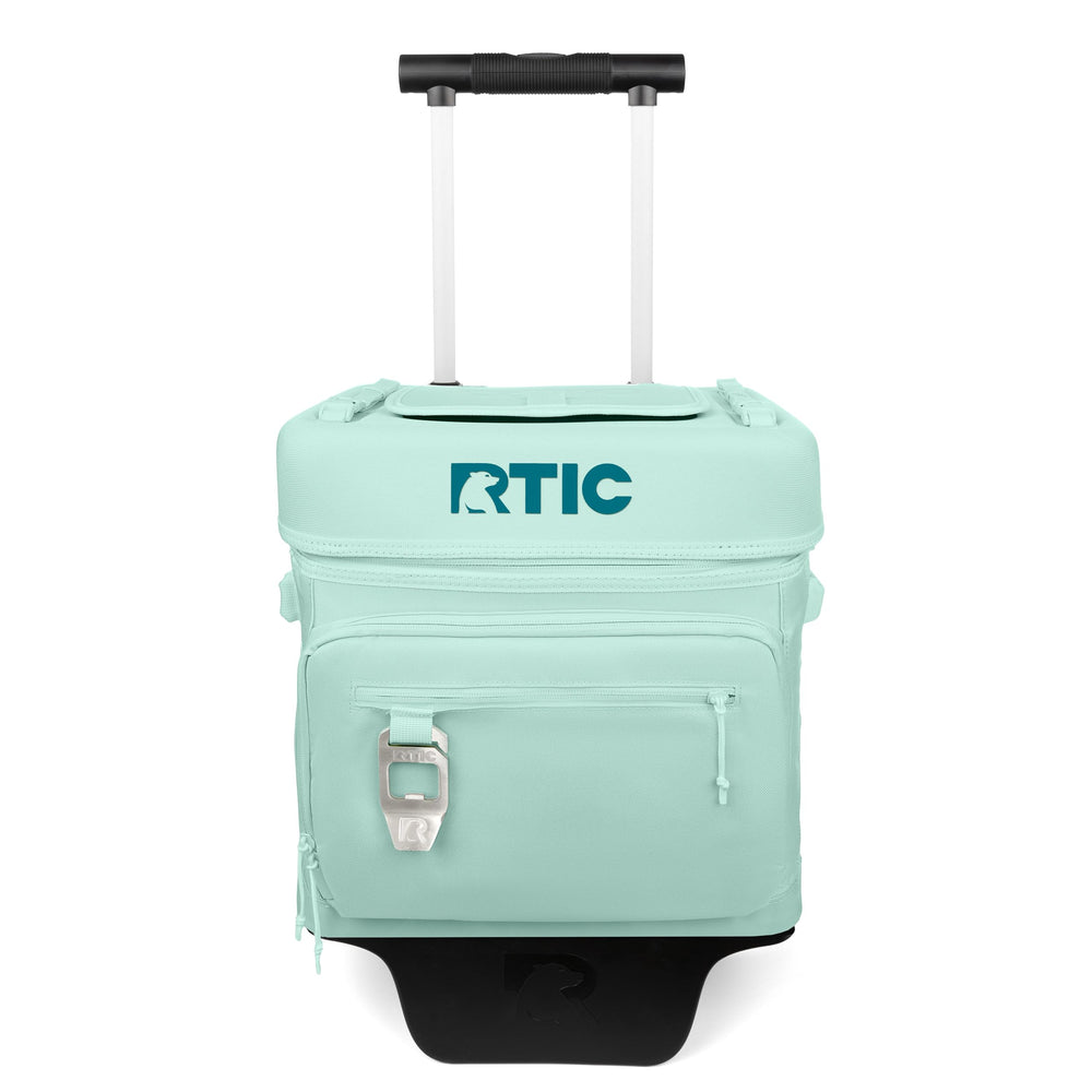 RTIC 40 Can Everyday Wheeled Cooler on rough terrain for easy transport