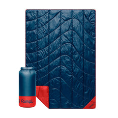 Rumpl Backcountry Puffy Blanket packed in its roll-top bag for easy carry and ready warmth.