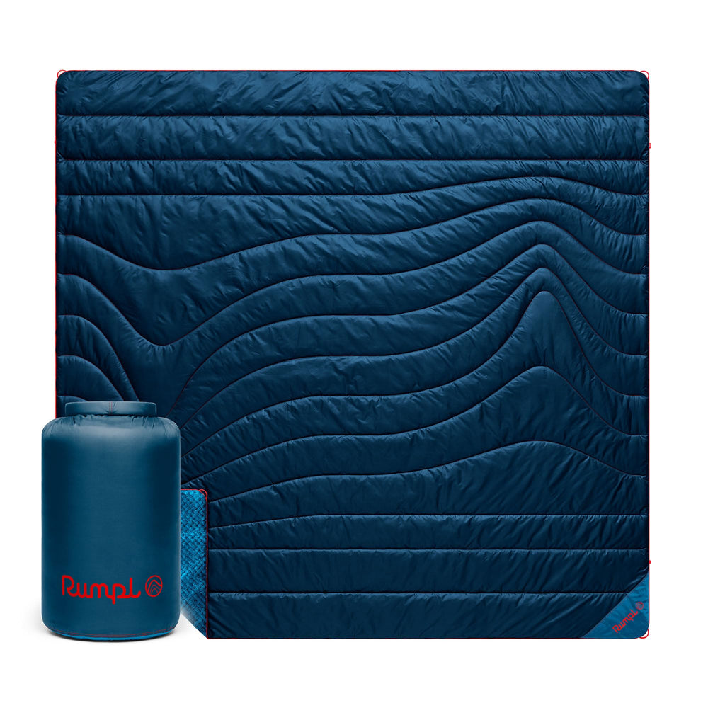 Rumpl fleece puffy blanket close-up shows plush fleece for cozy warmth on cold evenings.