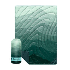 Rumpl Original Puffy Blanket cascade fade green folded for portable warmth