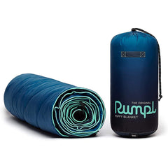 Rumpl Original Puffy Blanket Ocean Fade packed for easy backpack trips