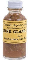 Russ Carman Mink Gland Lure bottle offers strong odor for winter mink trapping success.
