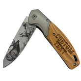 Sandpiper Ink custom engraved Damascus knife with elk blade, ideal gift for milestones.