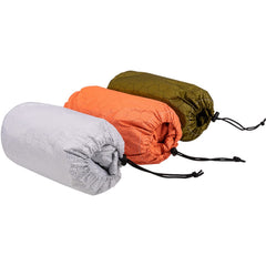 Sanmum emergency sleeping bag in use green to stay warm on camping trips.