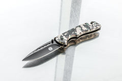 SE Drop Point Desert Digital Camo handle pattern showing grip in varied conditions