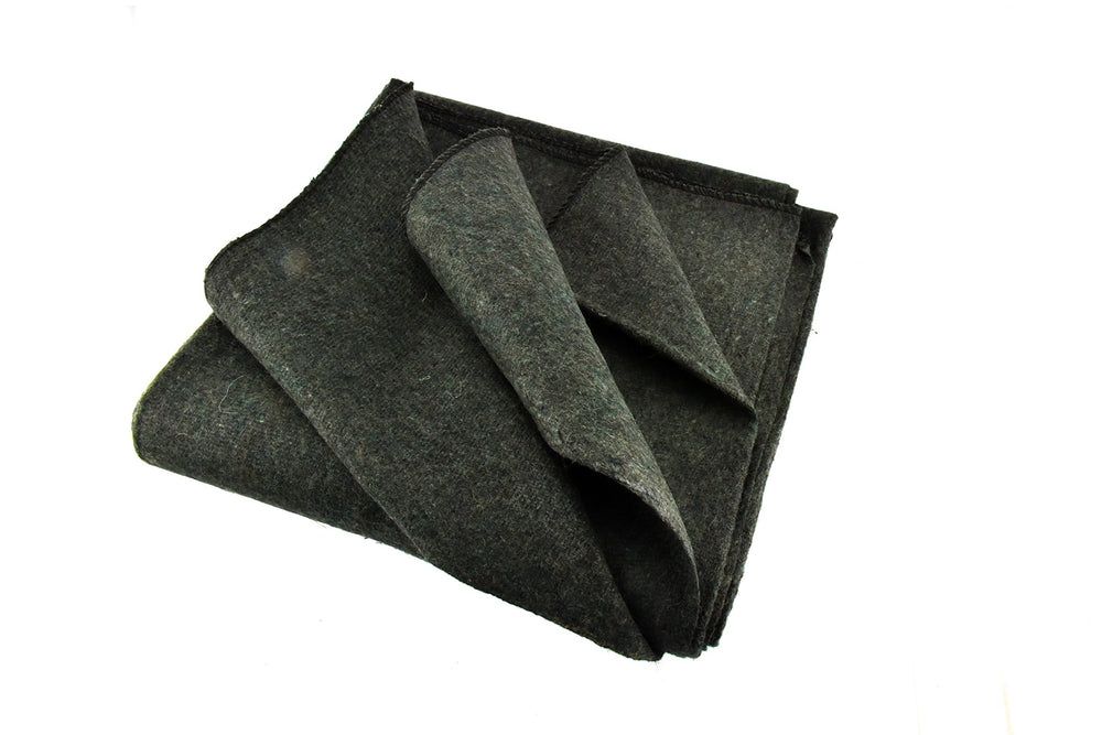 SE Green blanket folded for compact warmth on the go.