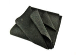 SE Green blanket folded for compact warmth on the go.
