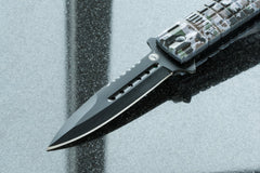 SE Spear Point Folding Knife with window breaker for roadside safety.