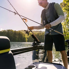Sea-Doo secure rubber-cap design holds a fishing rod in place on the rail.