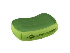 Sea to Summit Aeros Premium inflatable pillow in lime offers ergonomic neck support for travel comfort.