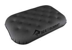 Sea to Summit Aeros Ultralight Deluxe pillow inflated for bed-like comfort outdoors.