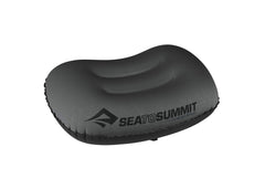 Sea to Summit Aeros Ultralight Pillow inflated for back sleeping on trail, showcasing comfort.