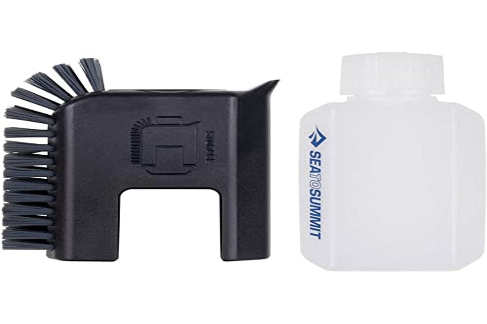 Sea to Summit kitchen brush and soap in black for quick, efficient dish cleaning.