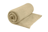 Sea to Summit Tek Towel plush fabric close-up showing soft terrycloth handfeel for comfort.