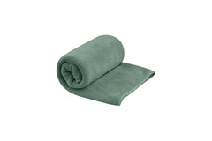 Sea to Summit Tek Towel Small Sage Green folded for easy packing and plush comfort.