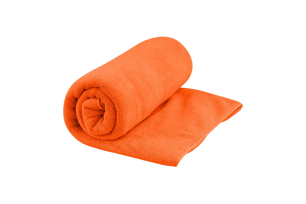Sea to Summit Tek Towel plush camping scene highlighting ultra-soft, absorbent fabric.
