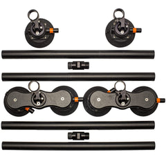 SeaSucker 48-inch Monkey Bars cross bars on a roof with vacuum mounts for versatile gear