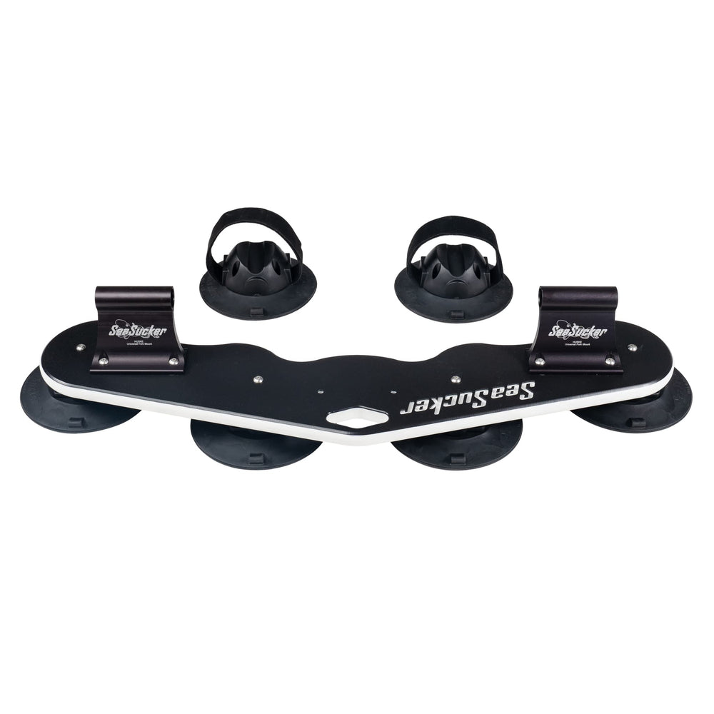SeaSucker Mini Bomber Max bike rack mounted on a car roof for easy, secure transport.