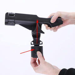 Boat track-mounted fishing rod holder installed