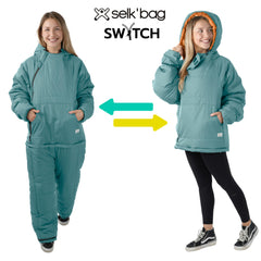 Selk'bag SWYTCH Lite convertible jacket-sleeping bag showing 2-in-1 versatility for outdoors.