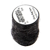 Semperfli Dirty Bug Yarn Mottled Chironomid shown on a rope for versatile dubbing and realism.