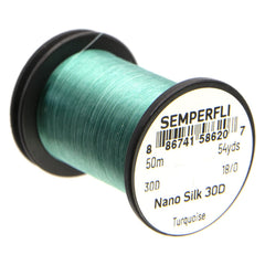 Semperfli Nano Silk Ultra 30D-18/0 turquoise thread on spool, ideal for micro flies and flat wraps.