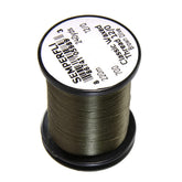 Semperfli Waxed Classic Thread bottle closeup highlighting color variety for precise fly tying