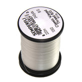 Semperfli waxed polyester thread closeup showing smooth fibers for reliable fly tying.