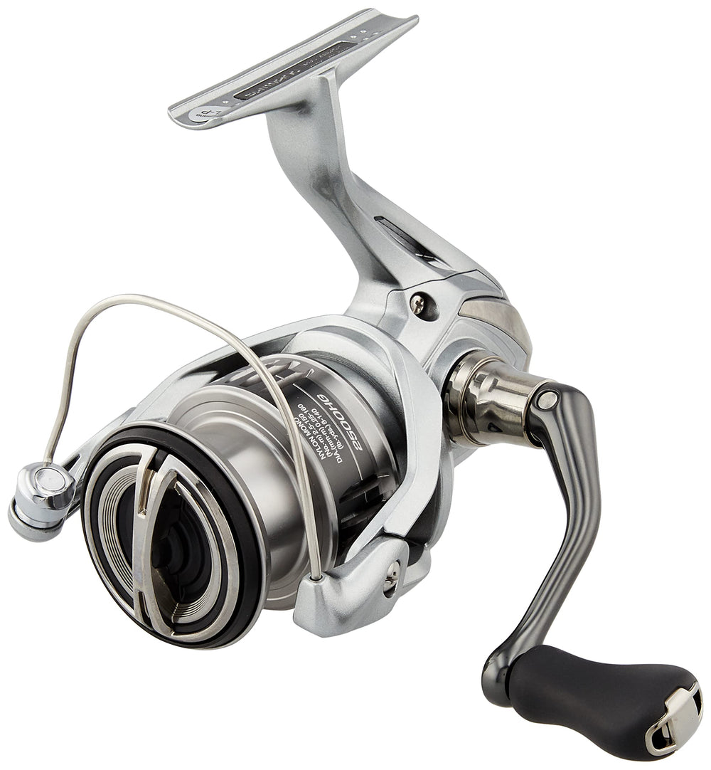 Shimano Nasci 2500HG ambidextrous reel in hand for versatile casting.
