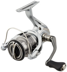 Shimano Nasci 2500HG ambidextrous reel in hand for versatile casting.