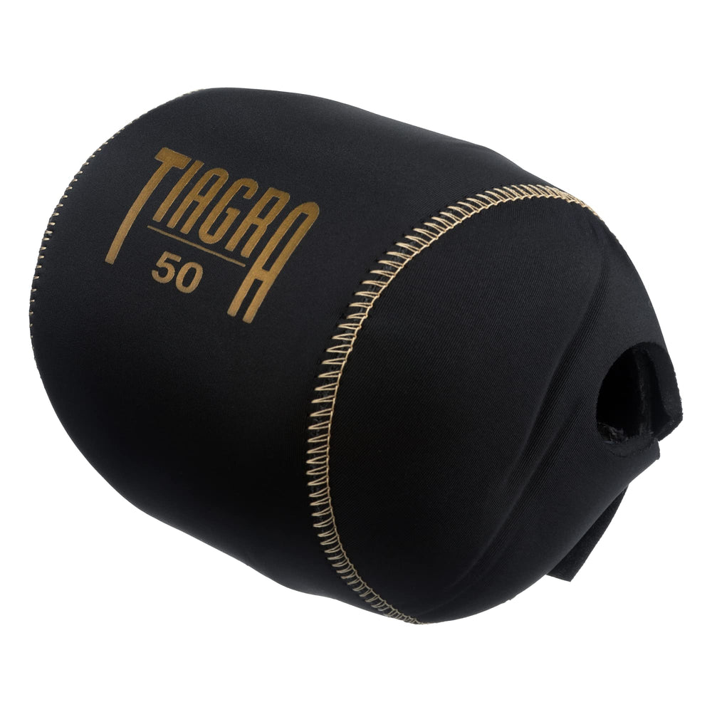 Shimano Tiagra reel cover with gold logo on glossy fabric for premium protection.