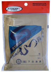Shimoda Fishing Gear HP shimoda-shaped diaper needles on regular surface for precise tackle maintenance.