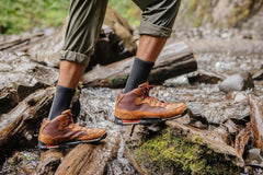 Showers Pass waterproof socks during a snowy run offer warmth and breathability