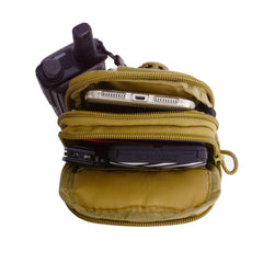 Skingwa waist pack open with several pockets for organized small items.
