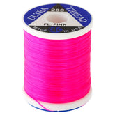 UTC Ultra Thread fluorescent pink spool showing vibrant color for durable fly ties