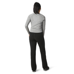 Smartwool women's straight leg pant in black, side view reveals clean lines for work.