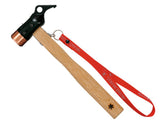 Snow Peak Copper Peg Hammer for Tent Stakes driving stakes securely on varied terrain.