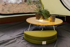 Snow Peak Lounge Cushion serves as a comfortable ground-seat outdoors.