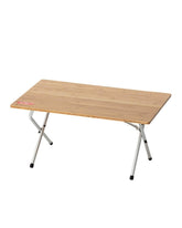 Snow Peak Single Action Camping Table assembled on campsite for easy outdoor dining