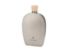 Snow Peak titanium flask bottle on flat lay highlighting ultra-light portability for camping