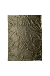 Snugpak Jungle Blanket compressed in its stuff sack, ready for travel.