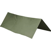 Snugpak Stasha Olive tarp folded compactly for easy storage and quick packing.