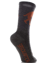 SockGuy Sasquatch 6in Wool Sock on foot during cycling for comfort and warmth.