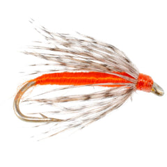 Close-up of Soft Hackle Partridge and Orange wet fly in water
