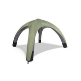 SOLI inflatable shade canopy packaged in a backpack for travel-friendly shade.
