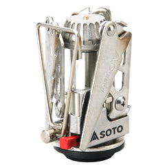 SOTO Compact Foldable Stove with a pot on a stove for outdoor cooking.