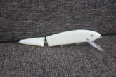 Speedlures 5-piece unpainted jointed musky lure blanks arranged for painting