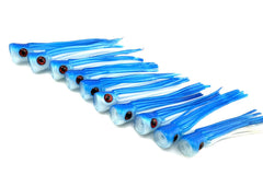 Squidnation Slammer Chugger blue-silver lure moving water for a strong trail.