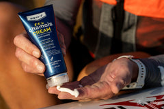 Closeup of applying Squirt Chamois Cream for smooth, non greasy comfort.