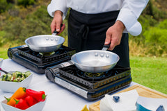 Sterno portable stove with carrying case facilitates easy transport for picnics and catering.